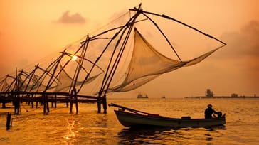 Kinesiske fiskenet i Cochin ved solnedgang