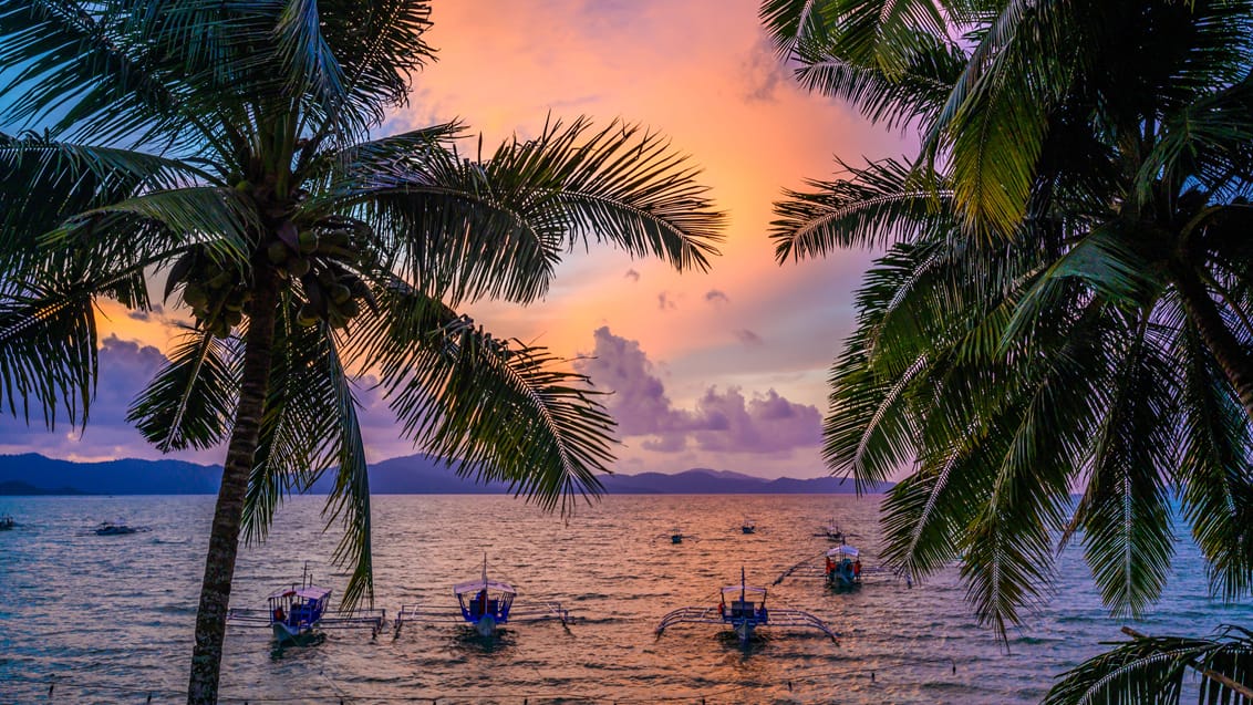 Solnedgang fra Port Barton på Palawan