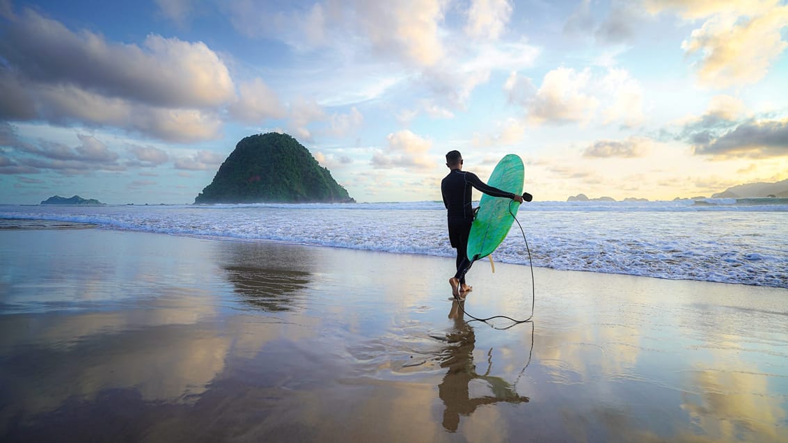 Surfing Red Island Beach, Java