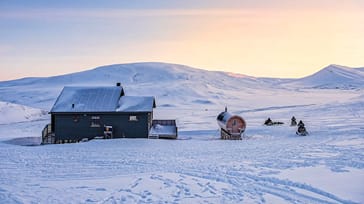 Svalbard Deluxe: Hundeslæde, snescootertur og gourmetoplevelser